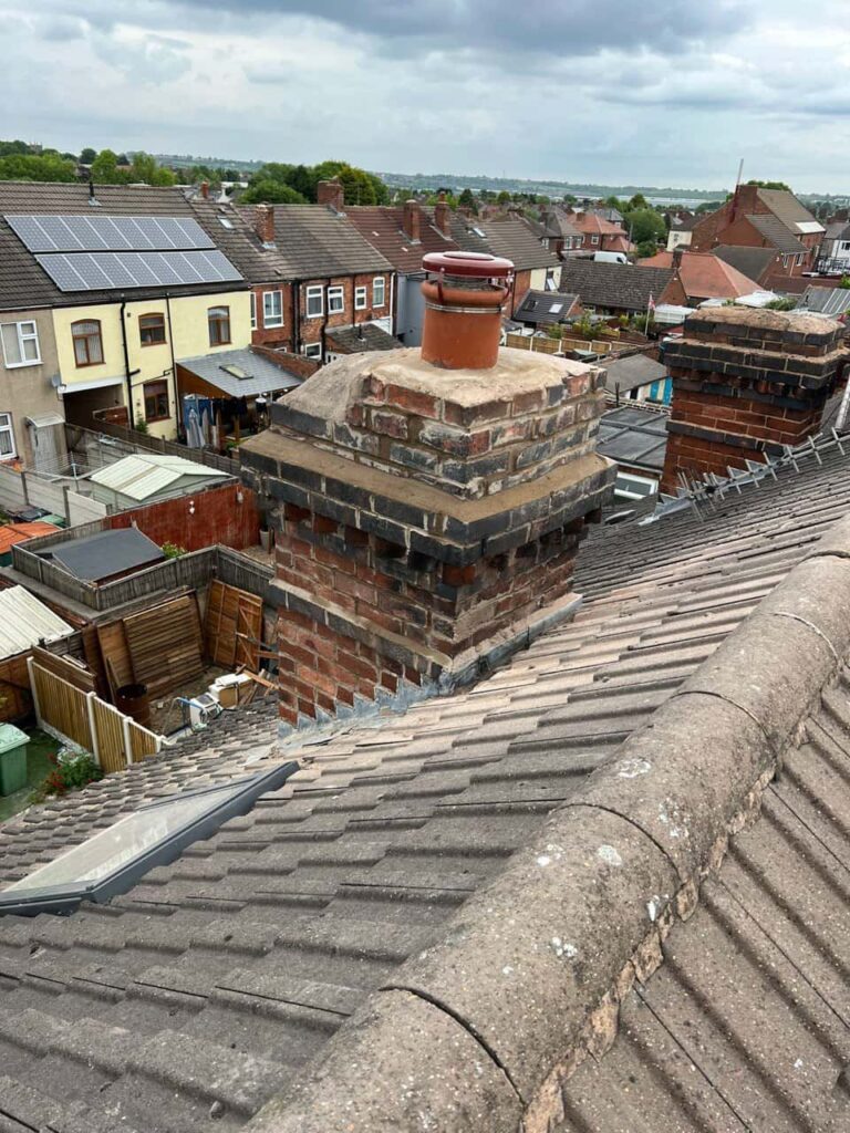 This is a photo taken from a roof which is being repaired by Saxilby Roofing Repairs, it shows a street of houses, and their roofs